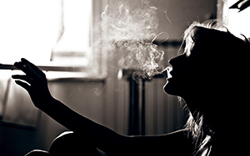Woman smoking image  